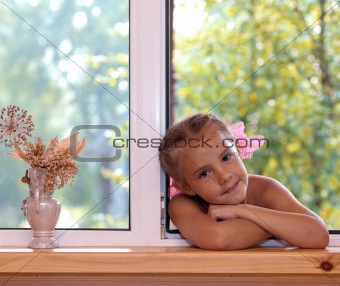 A girl in the window.