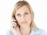 Frustrated businesswoman talking on phone