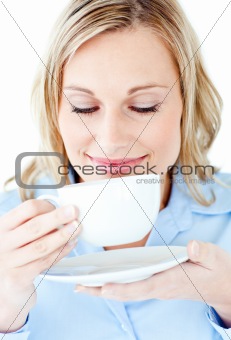 Happy businesswoman holding a drinking cup isolated