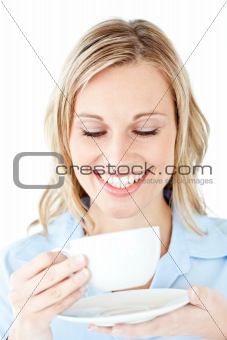 Glowing businesswoman holding a cup of coffee