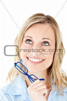 Close-up of a smiling businesswoman holding blue glasses