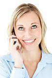 Laughing businesswoman talking on phone against white background