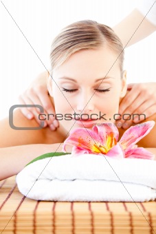Relaxed bright woman enjoying a back massage