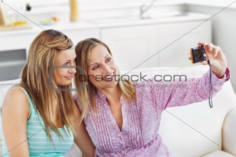 Female friends doing pictures of themselves