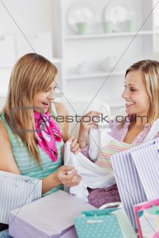 Blissful women with shopping bags 