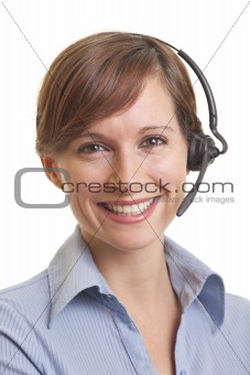 Portrait of smiling young woman telemarketer