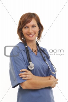 Portrait of smiling young woman doctor in scrubs