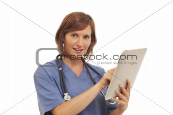 Portrait of young woman doctor in scrubs holding chart