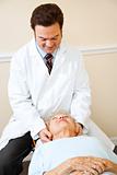 Chiropractor Treating Neck Pain