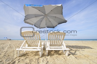 Chairs and umbrella on tropical cuban beach