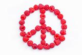 Raspberries arranged in the shape of the symbol of peace