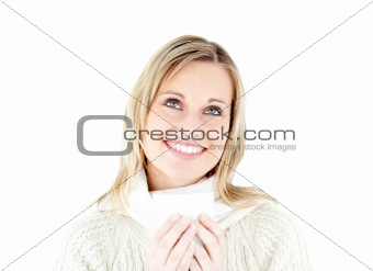 Smiling woman enjoying a hot coffee standing