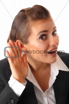 modern business woman holding hand at ear and eavesdrop