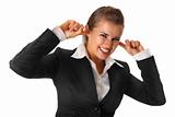 modern business woman closing ears with fingers