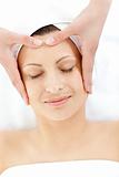 Pretty caucasian woman having a head massage
