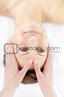 Attractive caucasian woman having a head massage 