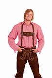 Happy casual Bavarian man with oktoberfest leather trousers (lederhose)