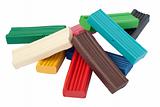 Heap of colored plasticine bricks