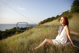 Girl at hill in sunrise.  