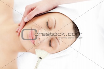 Young caucasian woman enjoying a beauty treatment 