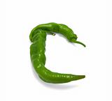 Letter C composed of green peppers