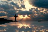 Cross in a Beautiful Sunset Reflection