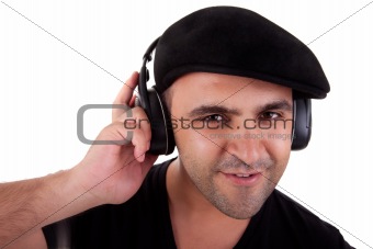 man listening music in headphones and smiling, isolated on white background, studio shot