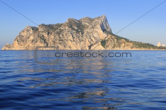 Ifach Penon mountain in Calpe from blue sea 