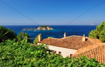 Greek village rooftops overlooking the Aegean
