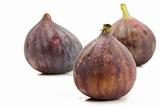 wet fig in front of two