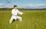 Young karateka trains in open air