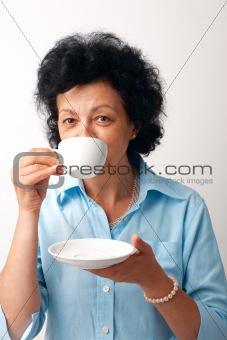 Elder Woman Drinking Tea.