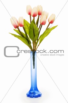 Pot with tulips isolated on white
