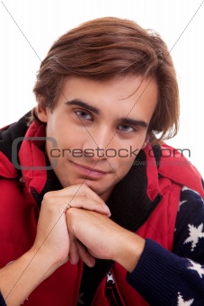 Portrait of a young man, in autumn/winter clothes, isolated on white. Studio shot