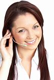 Smiling young businesswoman wearing headphones
