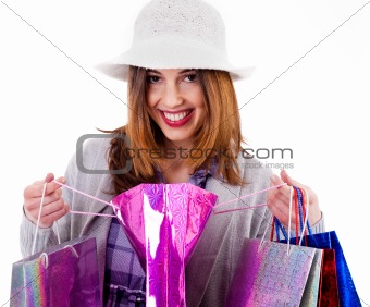 Woman showing her shopping bags