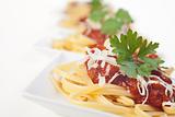 spaghetti with tomato sauce and parsley