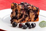 blueberry cake on a square plate