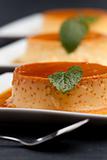 creme caramel on a square plate