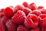 raspberries against white