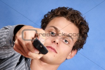 Young man with remote control