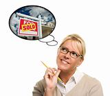 Woman with Thought Bubbles of a Sold Real Estate Sign to a New Home Isolated on a White Background.
