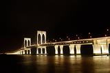 Bright bridge in dark night