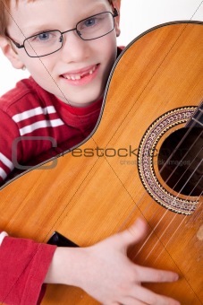 Cute boy with a guitar,
