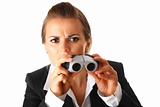 interested modern business woman with  binoculars