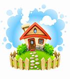 fairy-tale house on lawn with fence