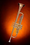 Gold Trumpet Isolated on Spotlight
