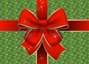 Christmas gift package with a red bow