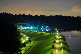 Reservoir with lighted meadows by night