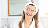 Smiling woman wearing headband in the bathroom